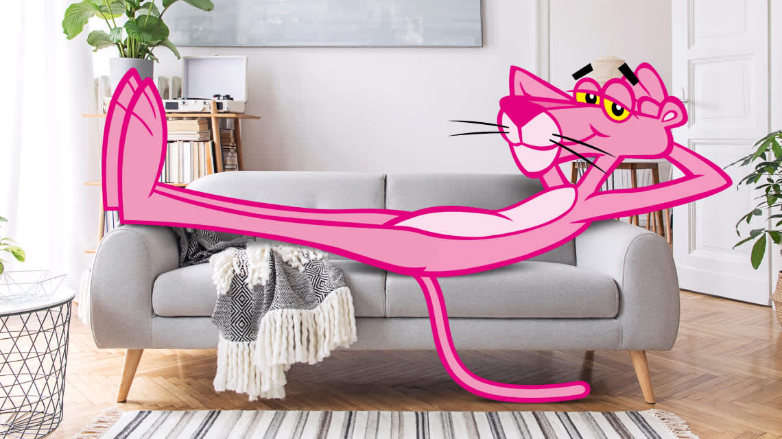 pink panther laying on couch
