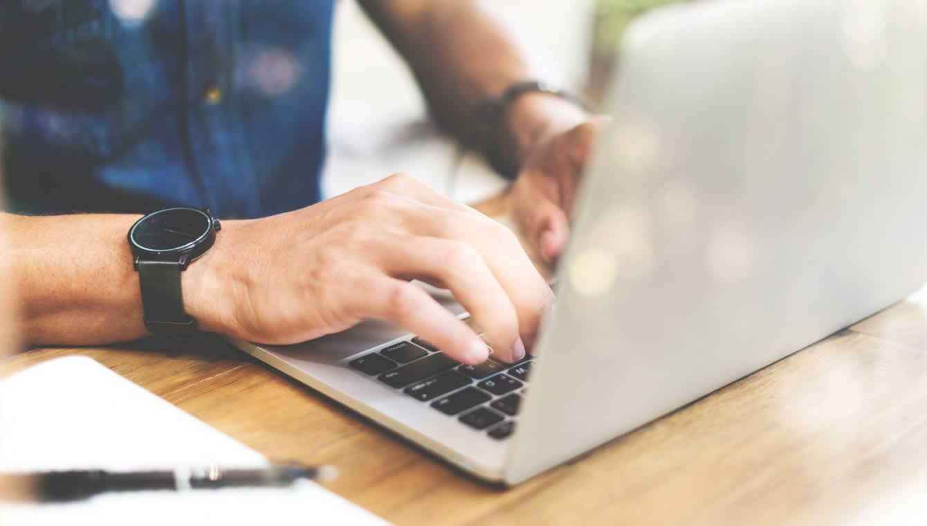 Image of a user looking at the computer