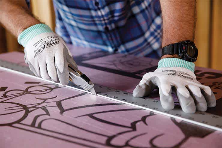 professional cutting pink foamboard insulation