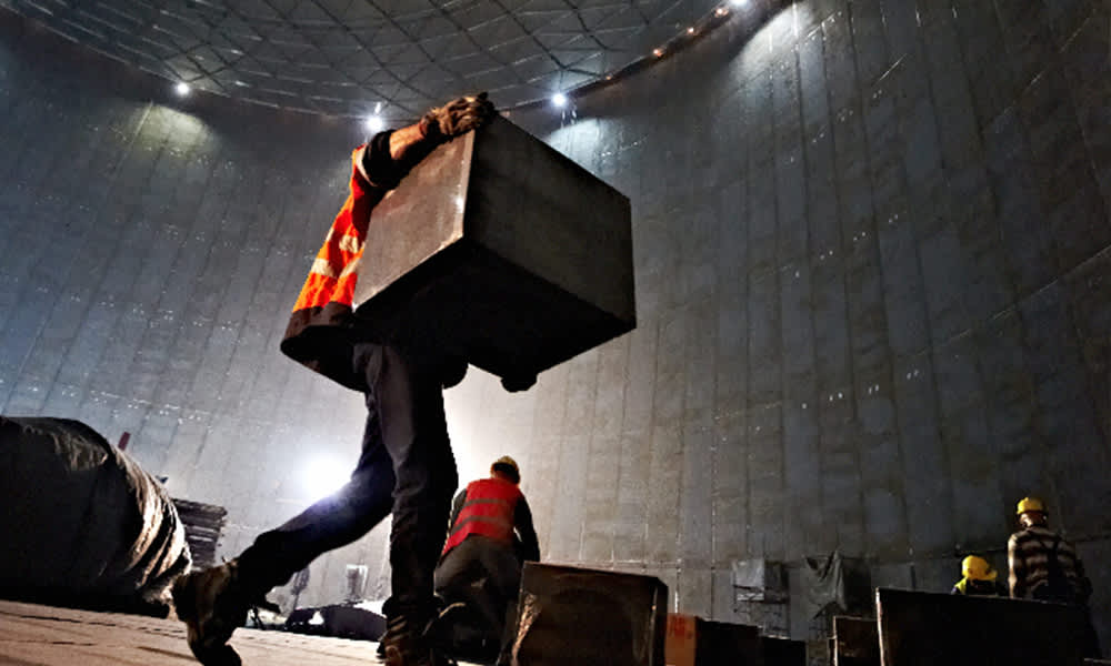 Plant worker working inside of a tank