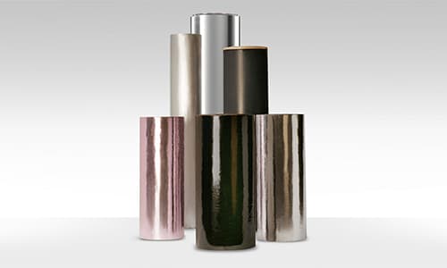 Pieces of metal pipe jacketing material