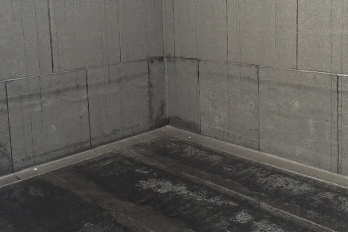 Interior of an impounding basin with Foamglas insulation on the walls. 