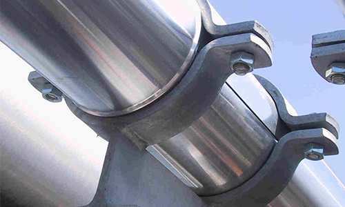 Close up of metal pipe cradles