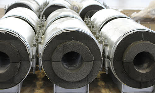 Several sections of pipe supports with Foamglas insulation