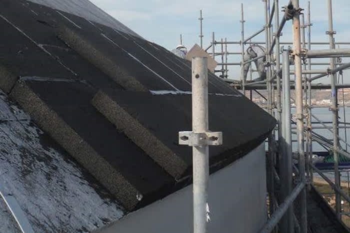 Piping surrounding an ammonia tank