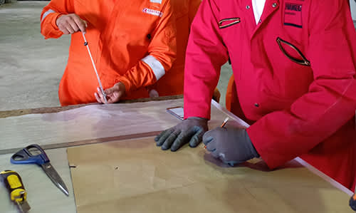 Photo of two people during on-site training