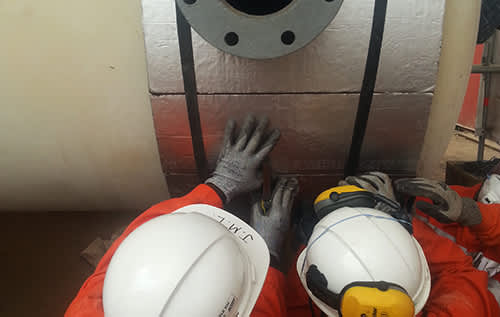 Photo of two workers