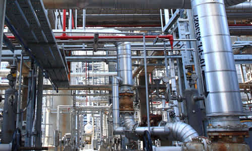 Piping with cladding