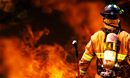 Fireman looking at fire