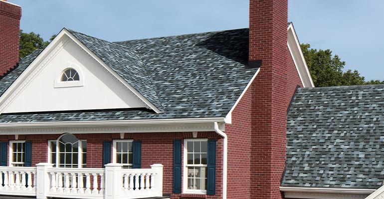 Red Brick home with Owens Corning Roofing Shingles