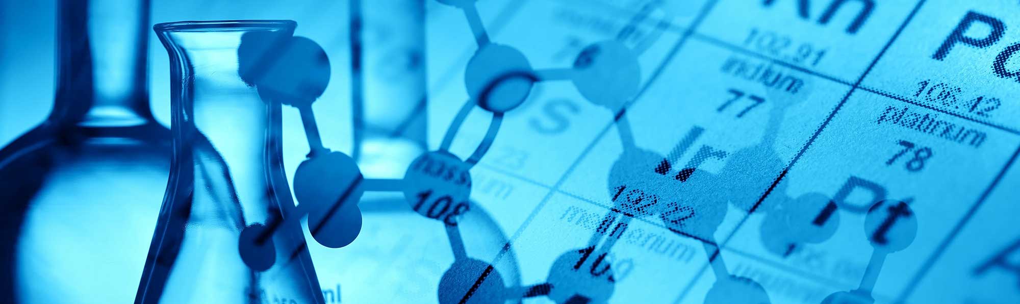 Chemical containers against a blue periodic table background