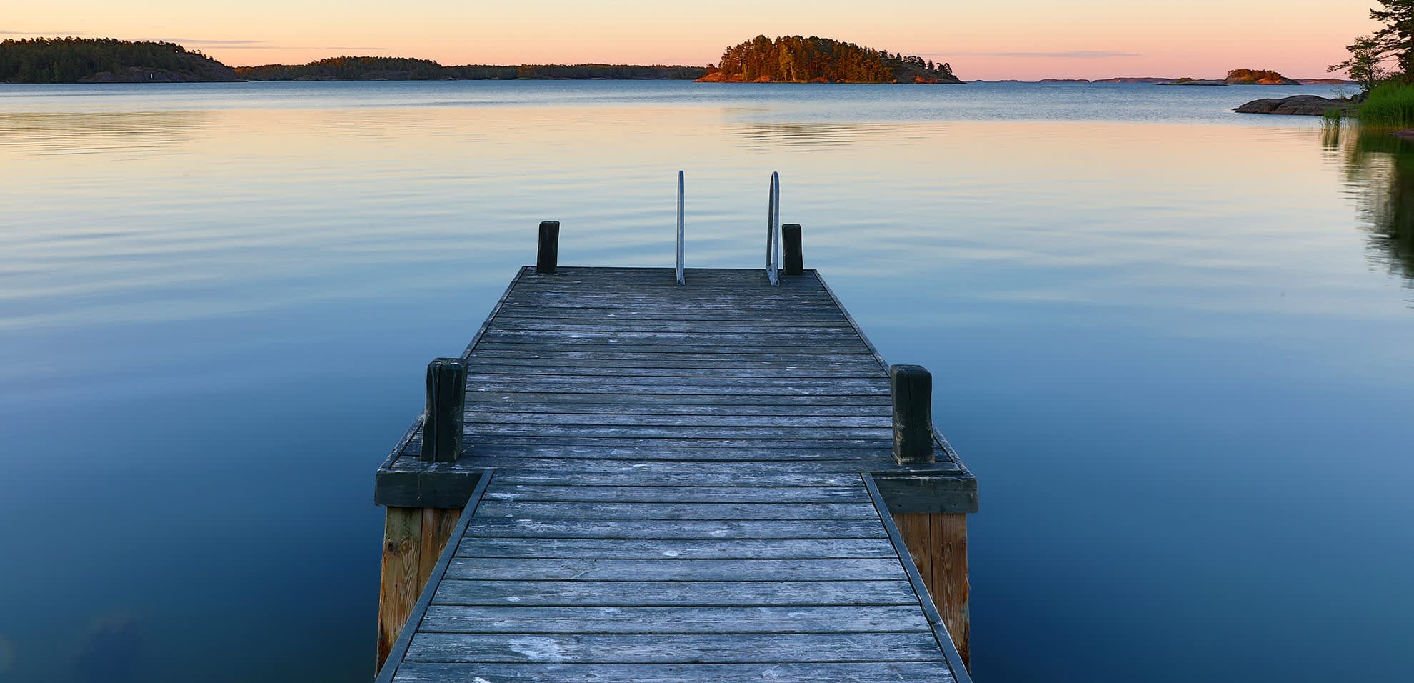 a pier on a lakeside in Parainen, Finland