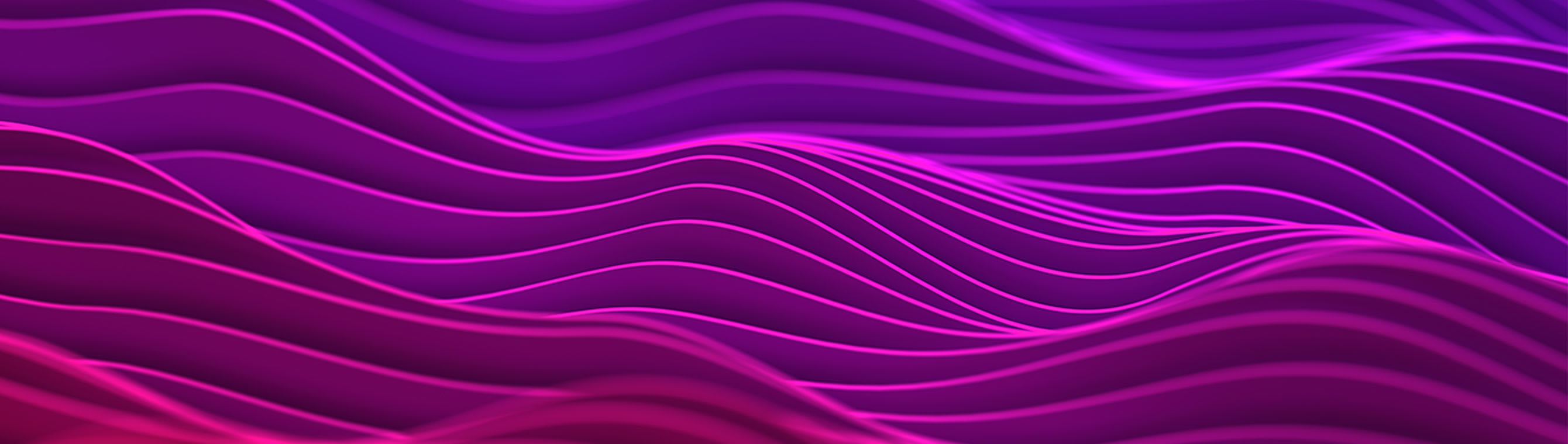 Zoom in on a curved building set against a blue sky