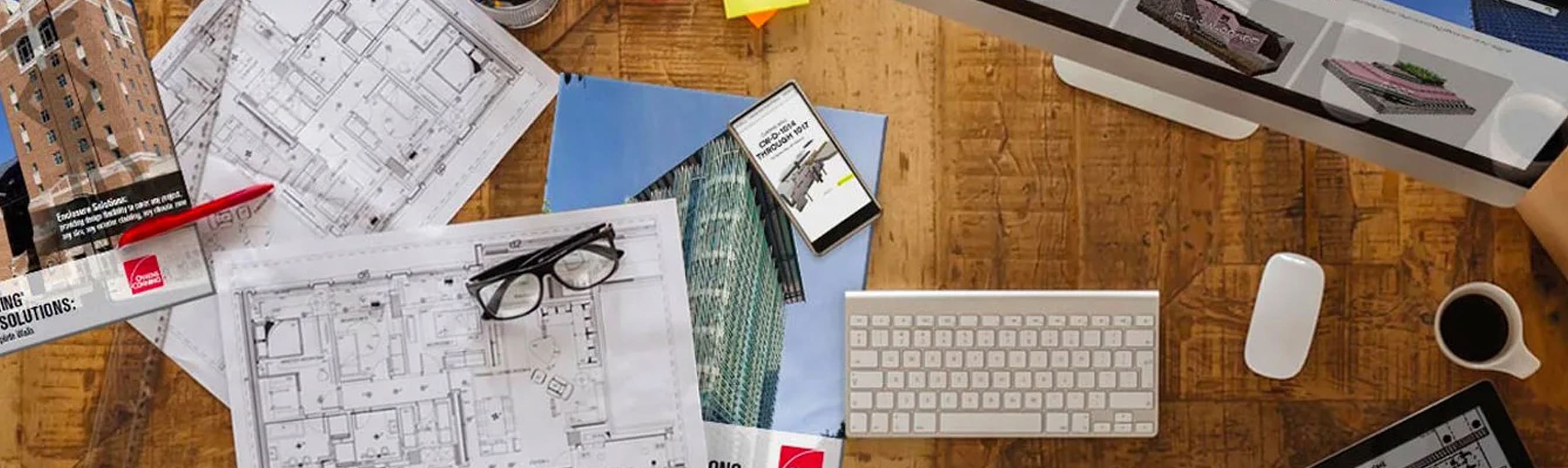Collection of architecture design documents on a desk