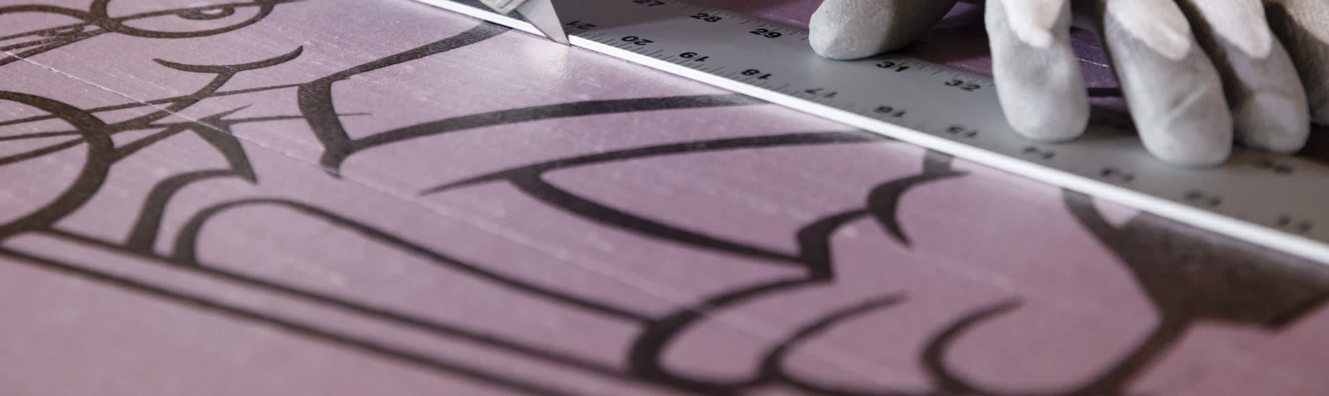 Contractor cutting FOAMULAR XPS insulation for installation