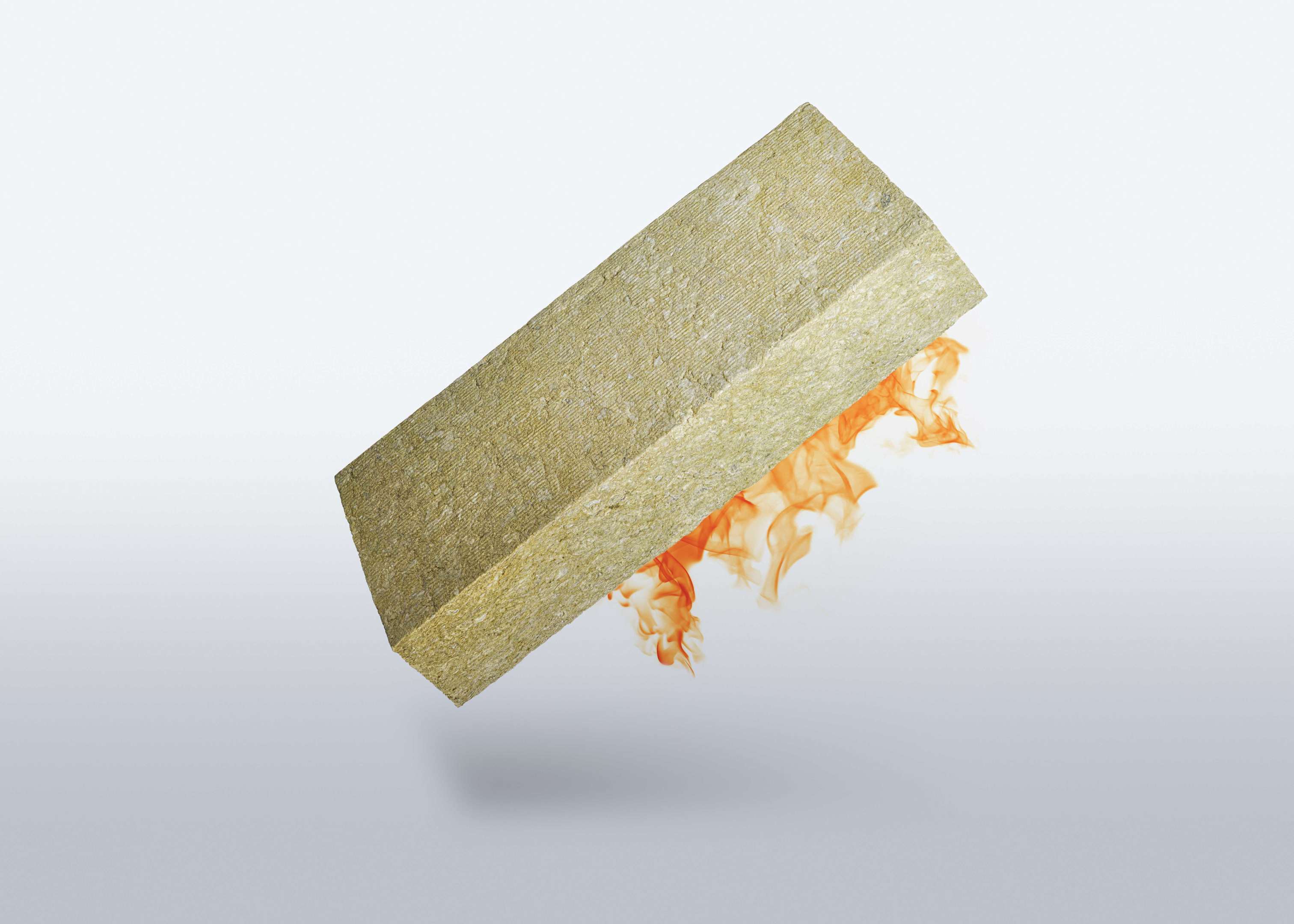 En stenuldsplade med flammer indikerer, at stenuld er en ubrændbar isolering.