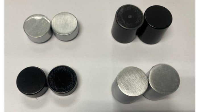 Four sets of two each of door stops.  Two pair are stainless, two pair are black, two pair are tall, and two pair are short.