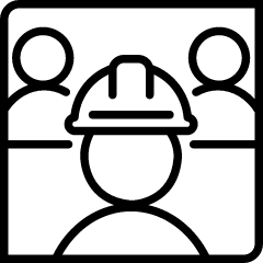 Black illustration icon of a construction working standing in the forefront with their hard hat and two individuals standing behind them in the distance.